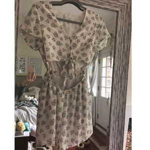 Lucca Romper floral pattern lightweight fabric.